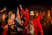 A wrestling fan at Pumpehuset, Copenhagen, who can't keep her hands off Chaplain William Eaver