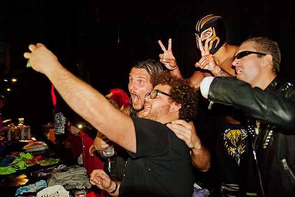 Wrestling fans taking selfies with wrestlers at Pumpehuset, Copenhagen