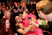The spray-tanned, pink-clad douchebag Valentine taking liberties with the audience at Moriskan