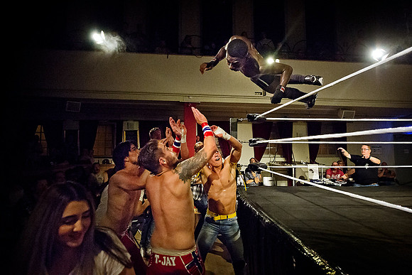 Fiescher performing a suicide dive against Sons of Norway